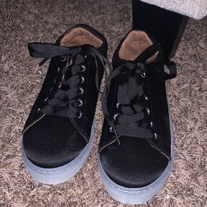 Black satin sneakers by Qupid